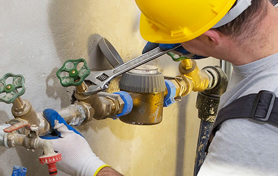 Sewer line repair in progress, plumber is using advanced tools to replace pipes in Leon Springs, TX.