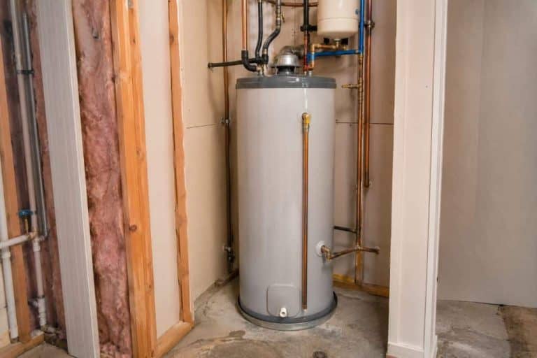 Tank water heater installed in a residential utility room for Water Heater Installations in Boerne, TX.